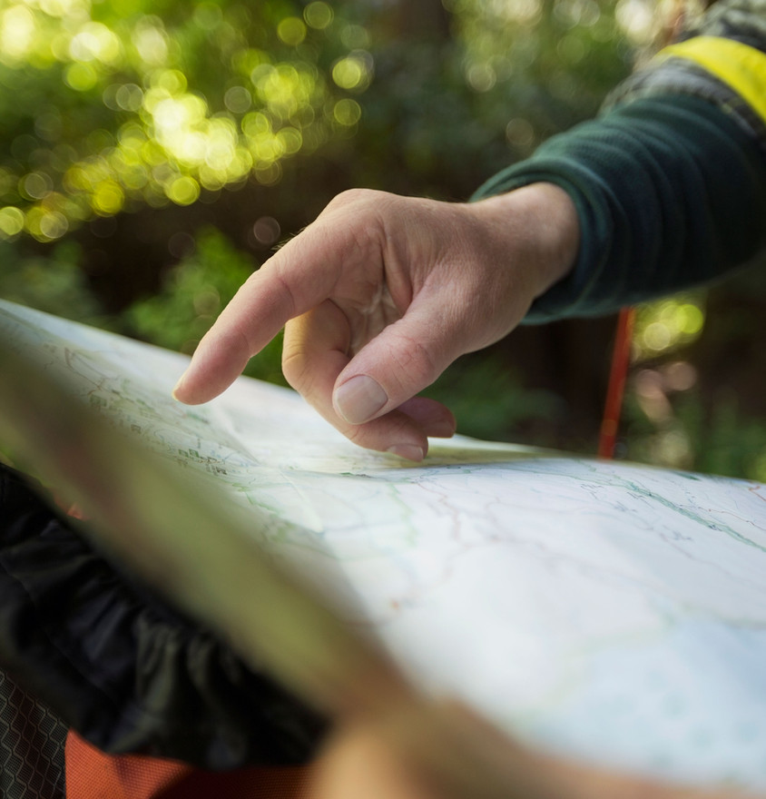 Guy pointing at map